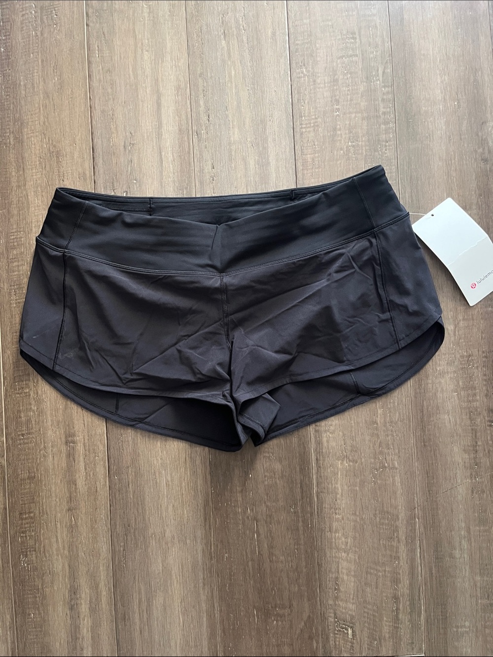 Lululemon Speed Up Size 10   2.5” Low Rise Black Shorts